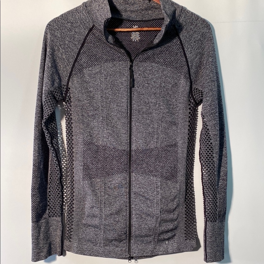 Gray Athletic zip up jacket.